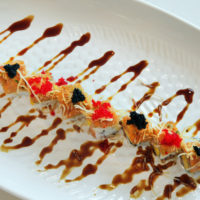 Featured Roll: RICO ROLL <br>topped with spicy tuna and caviar